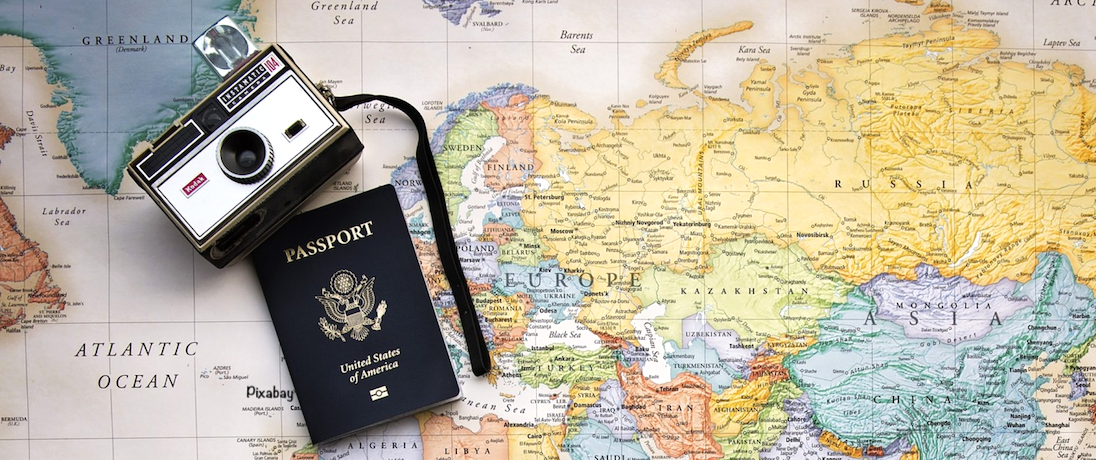 alt= Vacation Planning, Camera, Passport Map Photo"