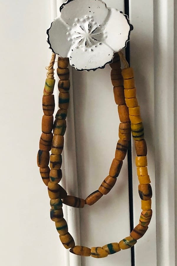 alt="Shopping in Bay St Louis at Antique Maison purchased a strand of bead for only $4. Pictured."