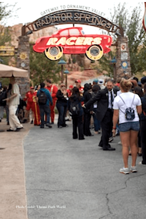 alt=" You don't imagine standing in long lines like the one pictured at radiator springs racers at Disney California."