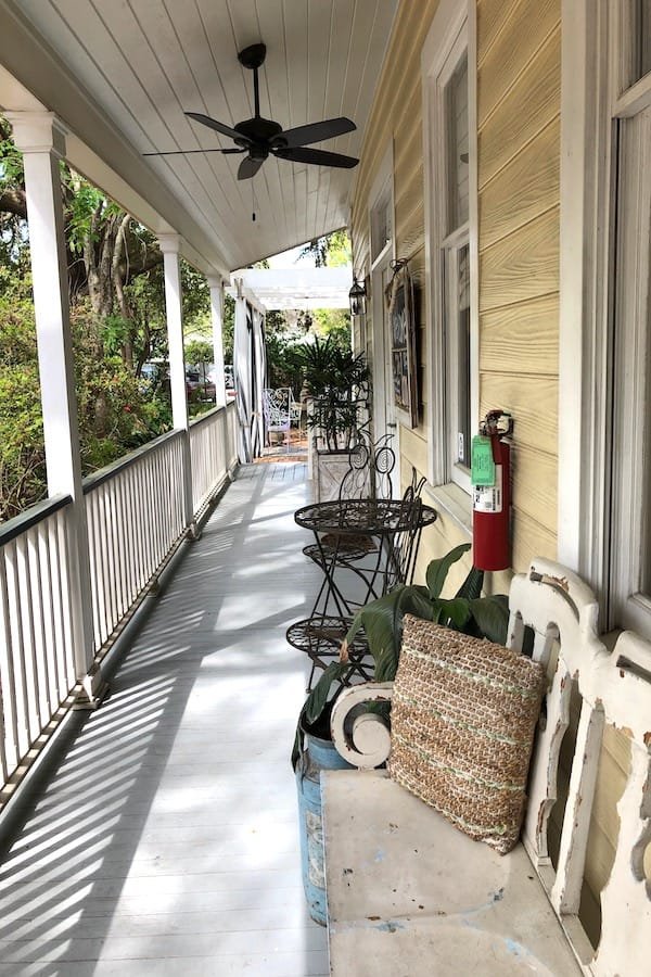 alt="Porch Sittin' at the Inn, Ocean Springs, Mississippi."