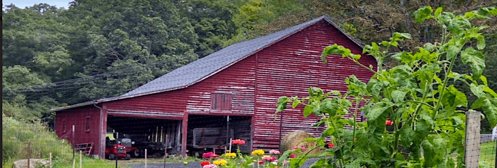 alt="Avoid Vacation Option Overload and Travel Happier, photo of a rural farm."
